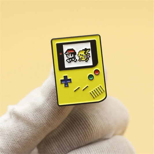 Yellow handheld Pokemon Pikachu gaming console with pixel art on a beige background