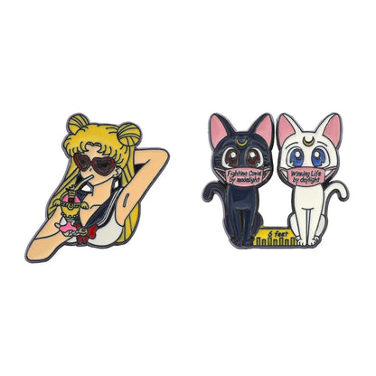 Sailor Moon anime enamel pins featuring a Sailor Moon character, a black cat, and a white cat on a white background in Chill vibe