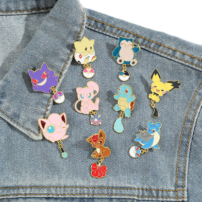 Set of colorful Pokemon enamel pins on a denim jacket