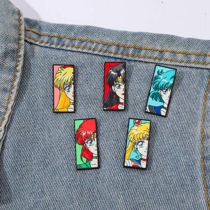 Sailor Moon anime-style character 5-piece pins on a denim background