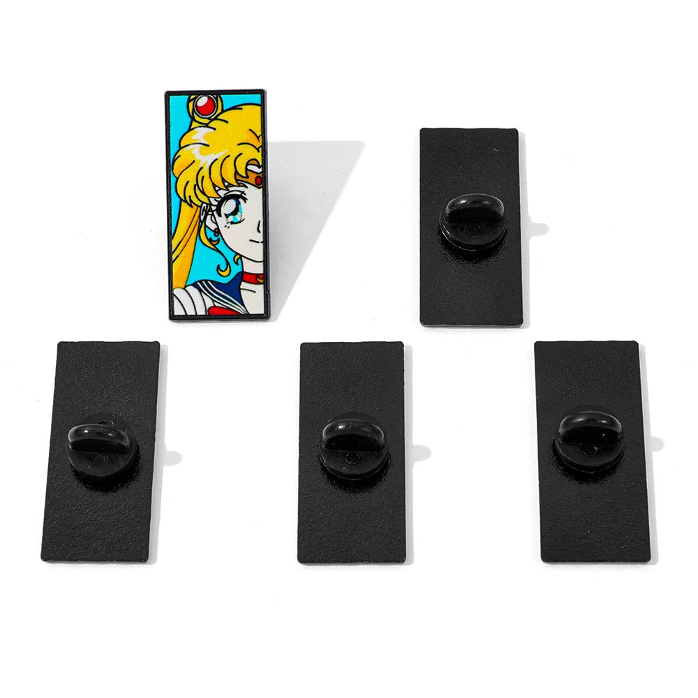 Set of black rectangular pins with a colorful anime-style character on one pin.