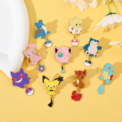 Collection of colorful Pokémon lapel pins on a yellow background with flowers.